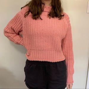 pink turtleneck knit sweater
